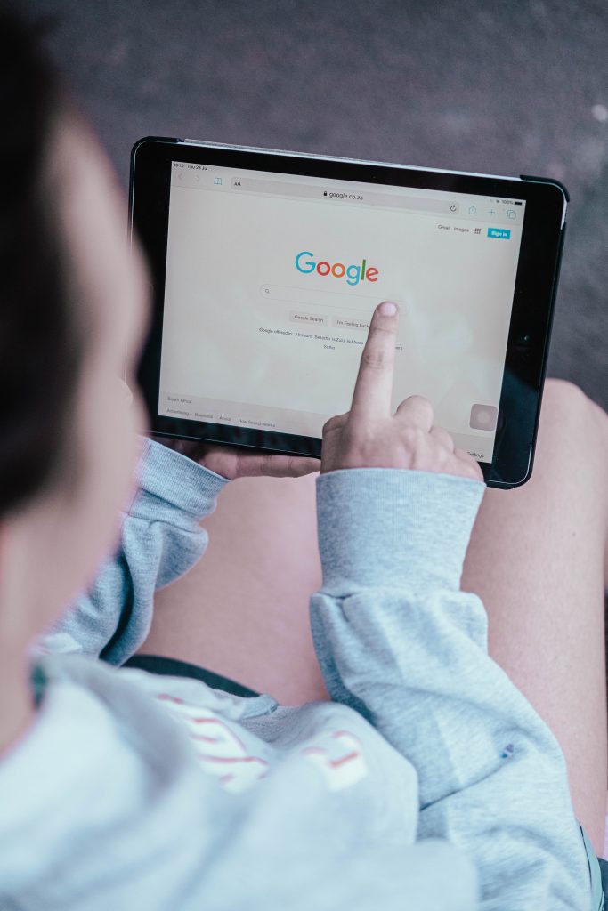 woman searching on Google - SEO